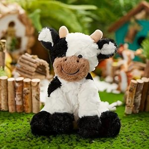 ふわふわ笑顔の白黒牛ぬいぐるみ