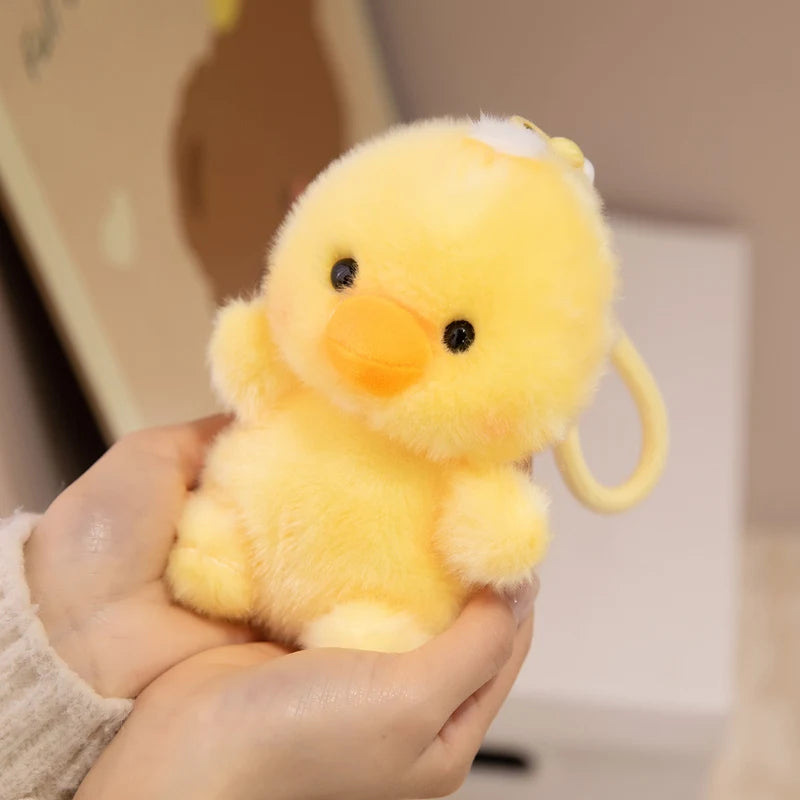 ふわふわの白い子犬ぬいぐるみキーホルダー - 画像 (4)