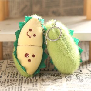 ふわふわ緑の恐竜キーホルダー 剥がせるスマイル