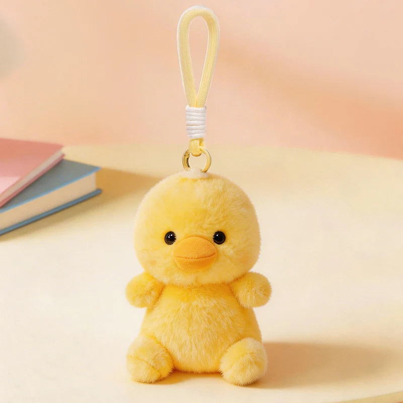 ふわふわの白い子犬ぬいぐるみキーホルダー - 画像 (10)